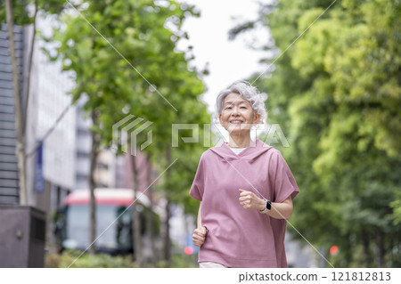Senior woman running in the city Senior woman running in the city 121812813