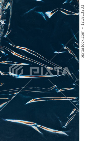 Creased foil. Old film overlay. Blue orange white color glitch light flares dust scratch particles defect wrinkled crumpled effect rough texture dark illustration art abstract background. Creased foil. Old film overlay. Blue orange white color glitch light flares dust scratch particles defect wrinkled crumpled effect rough texture dark illustration art abstract background. 121813233