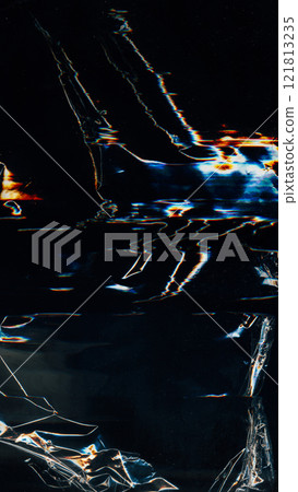 Glitch overlay. Creased film texture. Blue orange white color light flares artifacts dust scratch distressed uneven wrinkled foil defect dark illustration art abstract background. 121813235