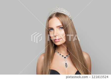 Pretty jewellery model woman wearing stylish gold earring and necklace with blue crystal sapphire Pretty jewellery model woman wearing stylish gold earring and necklace with blue crystal sapphire 121813524
