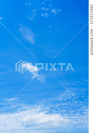 Expansive Light Blue Sky Stretching Overhead With Delicate Wispy White Clouds Floating Gracefully 121815482