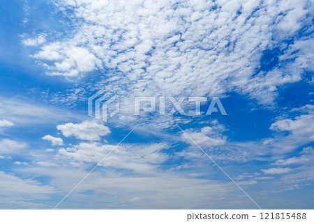 Stunning Blue Sky with Fluffy White Clouds, Perfect for Nature Lovers and Dreamers Alike Stunning Blue Sky with Fluffy White Clouds, Perfect for Nature Lovers and Dreamers Alike 121815488