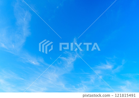Stunning Light Blue Sky with Fluffy White Clouds Ideal for Creative Projects and Background Designs Stunning Light Blue Sky with Fluffy White Clouds Ideal for Creative Projects and Background Designs 121815491