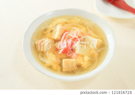 Crab stick and deep-fried tofu soup made with consommé Crab stick and deep-fried tofu soup made with consommé 121816728