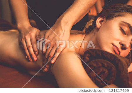 Caucasian woman customer enjoying relaxing anti-stress massage. Quiescent 121817499