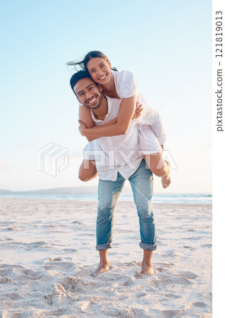 Couple, piggy back and happy on vacation, beach and portrait with adventure, love and bonding in summer. People, man and woman with connection, hug and comic games on holiday by ocean in Indonesia 121819013