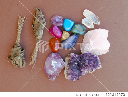Healing crystals on brown background Healing crystals on brown background 121819670