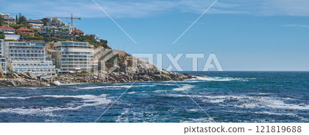 Coastal view of Cape Town and mountain landscape on a sunny day. View of the ocean and city against a blue horizon. A popular travel destination for tourists and hikers, in Lions Head, South Africa Coastal view of Cape Town and mountain landscape on a sunny day. View of the ocean and city against a blue horizon. A popular travel destination for tourists and hikers, in Lions Head, South Africa 121819688