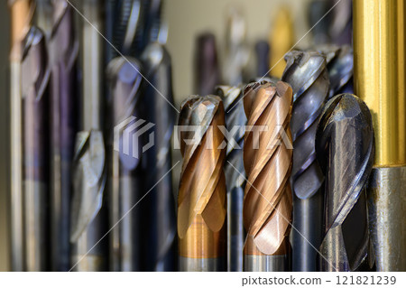 Close-up scene the group of used cutter end mill tools. Close-up scene the group of used cutter end mill tools. 121821239