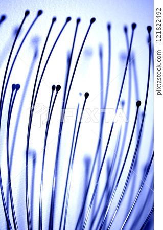 fiber optic cables macro close up in blue color toned image 121822492