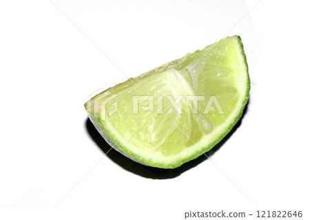 Close Up Of Sliced Lime on White Background Close Up Of Sliced Lime on White Background 121822646