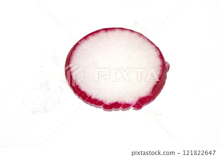 A Slice of Radish on a White Background A Slice of Radish on a White Background 121822647