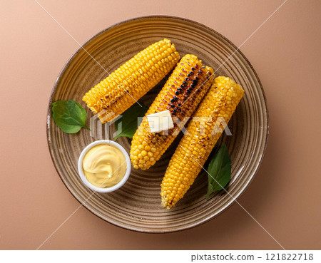 Grilled corn cob with butter 121822718