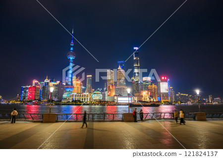 Night view of skyscrapers from the Bund in Shanghai, China Night view of skyscrapers from the Bund in Shanghai, China 121824137