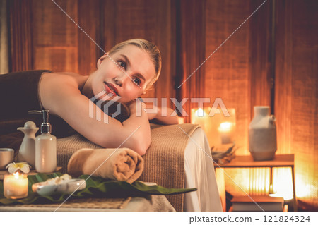 Caucasian woman customer enjoying relaxing anti-stress massage. Quiescent 121824324