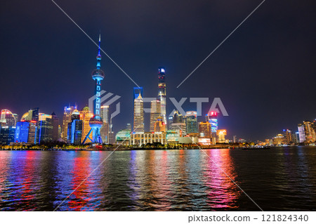 Night view of skyscrapers from the Bund in Shanghai, China Night view of skyscrapers from the Bund in Shanghai, China 121824340