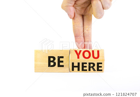 Be you and here symbol. Concept words Be here Be you on beautiful wooden block. Beautiful white background Businessman hand. Business motivational be you and here concept. Copy space. 121824707