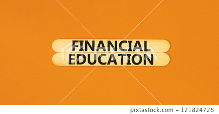 Financial education symbol. Concept words Financial education on beautiful wooden stick. Beautiful orange paper background. Business Financial education concept. Copy space. Financial education symbol. Concept words Financial education on beautiful wooden stick. Beautiful orange paper background. Business Financial education concept. Copy space. 121824728