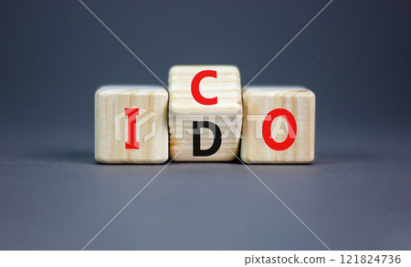 Initial coin or DEX offering symbol. Concept words abbreviation ICO or IDO on wooden block. Beautiful grey table grey background. Business Initial coin or DEX offering concept. Copy space. Initial coin or DEX offering symbol. Concept words abbreviation ICO or IDO on wooden block. Beautiful grey table grey background. Business Initial coin or DEX offering concept. Copy space. 121824736