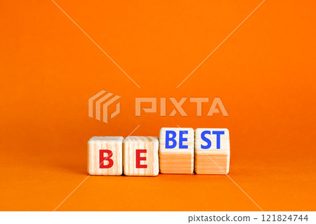 Motivational and inspirational be best symbol. Concept words Be best on beautiful wooden block. Beautiful orange table orange background. Business motivational be best concept. Copy space. 121824744