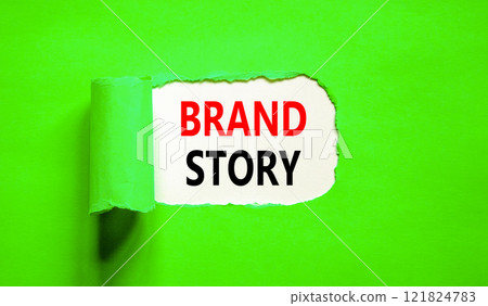 Brand story branding symbol. Concept words Brand story on beautiful white paper. Beautiful green paper background. Business brand story branding concept. Copy space. Brand story branding symbol. Concept words Brand story on beautiful white paper. Beautiful green paper background. Business brand story branding concept. Copy space. 121824783