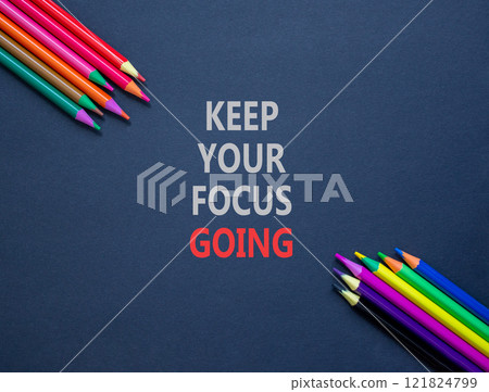 Keep your focus going symbol. Concept words Keep your focus going on beautiful black paper. Beautiful black background. Colored pencils. Business and keep your focus going concept. Copy space. Keep your focus going symbol. Concept words Keep your focus going on beautiful black paper. Beautiful black background. Colored pencils. Business and keep your focus going concept. Copy space. 121824799