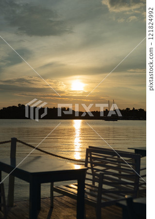 sunrise on the sea coast, cafe on the coast 121824992