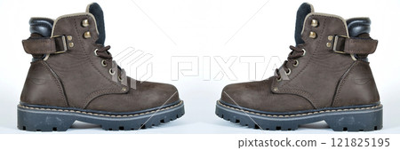 Hiking shoes and a white background, Sturdy hiking boots Hiking shoes and a white background, Sturdy hiking boots 121825195
