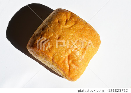 Fresh nutritious and golden colored bread isolated on white background 121825712