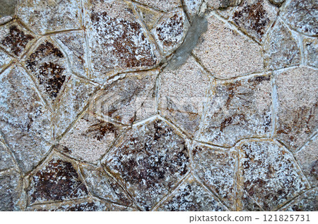 Sturdy yellow and beige cut stone wall, seamless lined up 121825731