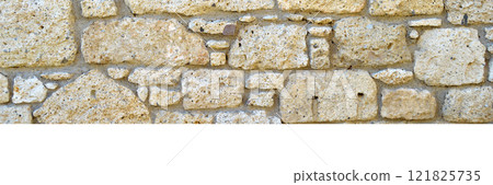 Sturdy yellow and beige cut stone wall, seamless lined up 121825735
