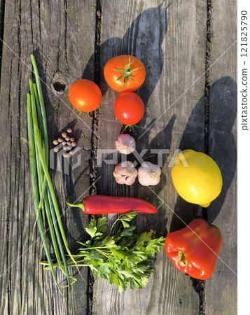Vegetables and fruits on a wooden table. High quality photos Vegetables and fruits on a wooden table. High quality photos 121825790