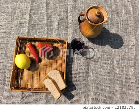Red pepper bread and a jug on the table. High quality photo Red pepper bread and a jug on the table. High quality photo 121825793