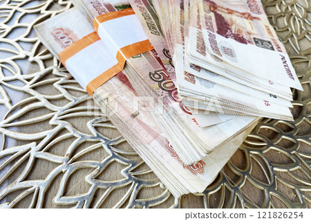 stacks of five thousand banknotes from the Bank of Russia stacks of five thousand banknotes from the Bank of Russia 121826254