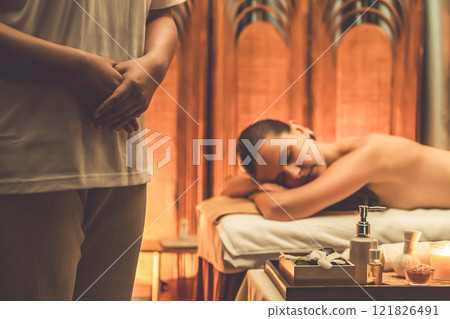 Caucasian woman customer enjoying relaxing anti-stress massage. Quiescent Caucasian woman customer enjoying relaxing anti-stress massage. Quiescent 121826491