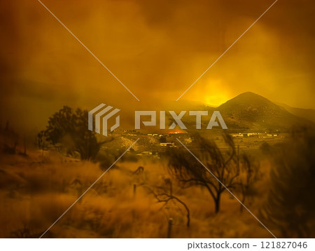 A breathtaking view of fiery skies illuminating a smokefilled and devastated landscape 121827046