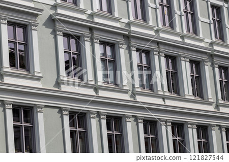 Facade of Historic Building with Symmetrical Windows 121827544
