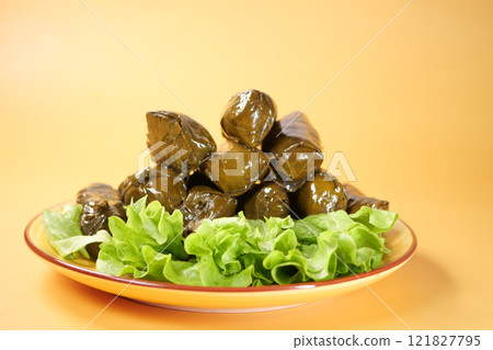 Traditional dolma grape leaves on a plate  121827795