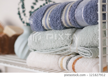 Beautifully Stacked Towels on a Shelving Unit Elegant Home Decor Beautifully Stacked Towels on a Shelving Unit Elegant Home Decor 121827912