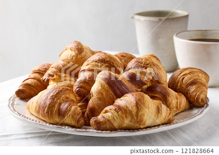 freshly baked croissants 121828664