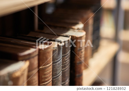 Old books in a library Old books in a library 121828932