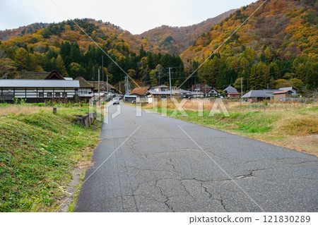Row of houses in Maesawa village 121830289