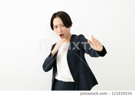 A woman in a fighting pose 121830554