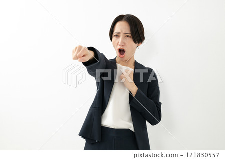 A woman in a fighting pose 121830557