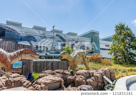 Fukui City, Fukui Prefecture: JR Fukui Station West Exit and the dinosaur monument in front of the station on a clear day Fukui City, Fukui Prefecture: JR Fukui Station West Exit and the dinosaur monument in front of the station on a clear day 121831181