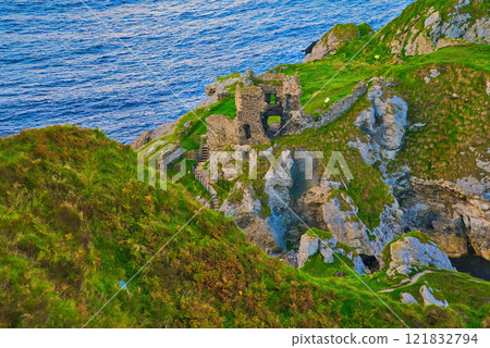 Kinbane Castle in Northern Ireland - The magnificent ruins of an ancient coastal structure provide Kinbane Castle in Northern Ireland - The magnificent ruins of an ancient coastal structure provide 121832794