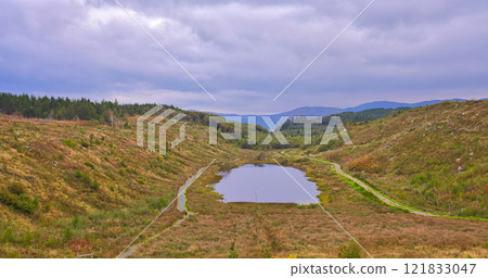 Cashelgolan Valley - An Incredible Aerial View Showing the Serene Lakes Surrounded by Beautiful Cashelgolan Valley - An Incredible Aerial View Showing the Serene Lakes Surrounded by Beautiful 121833047