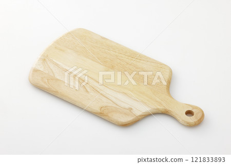 Wooden cutting board on a white background 121833893