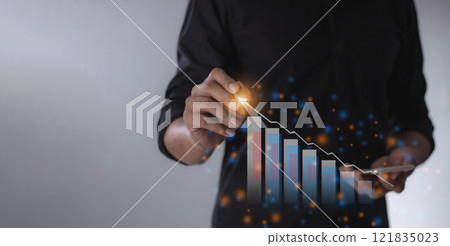 Young man with smartphone mobile hand hold a pen touching to visualize money growth  121835023
