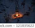 Candle lantern in the snow-03 121835622